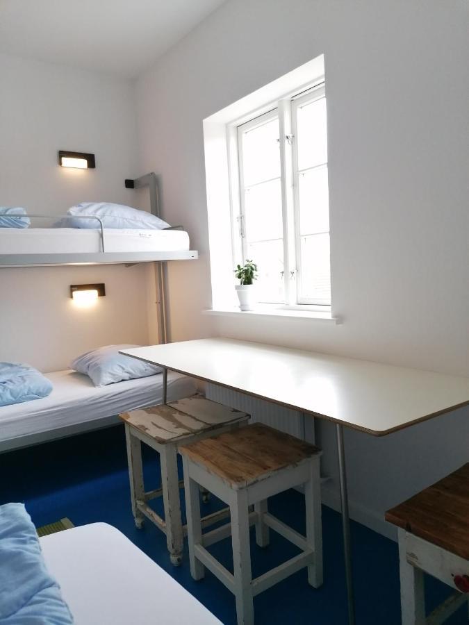 4-personersværelse med fælles badeværelse